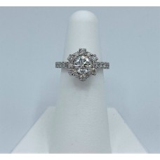 Custom platinum flower halo diamond ring