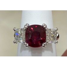 3 stone ruby and diamond cushion shaped ring