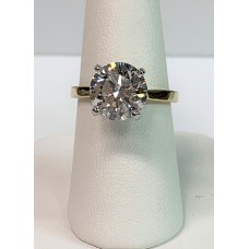 Platinum & 18 karat yellow gold diamond solitaire ring. 