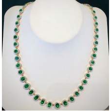 Tsavorite and diamond oval halo necklace